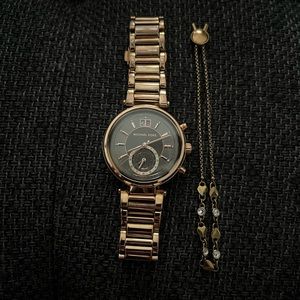 Rose Gold Michael Kors Watch and MK bracelet pair.